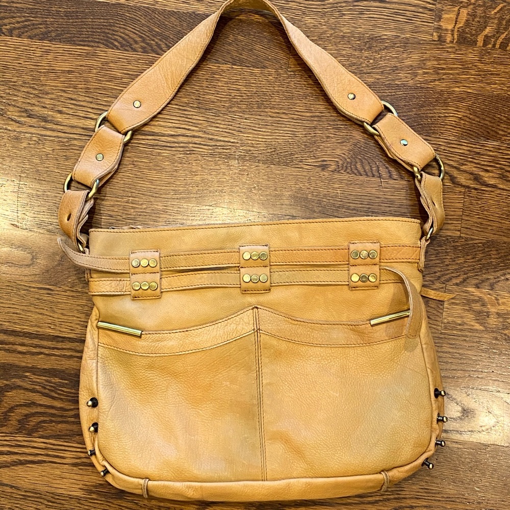 Killer Cut n Paste shoulder bag with brass hardware